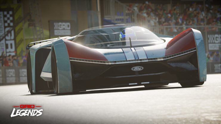 Imagem do jogo GRID Legends com o Team Fordzilla P1, com design esportivo e cores prata e vermelha, em pista de corrida.