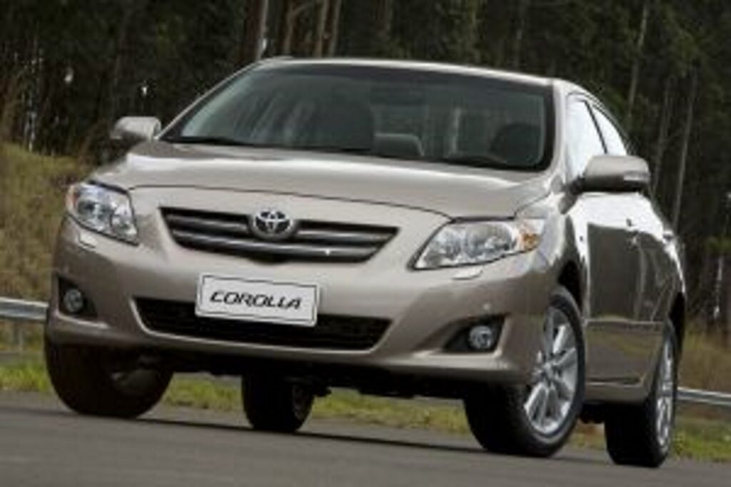 Toyota Corolla modelo 2009 décima geração champanhe de frente