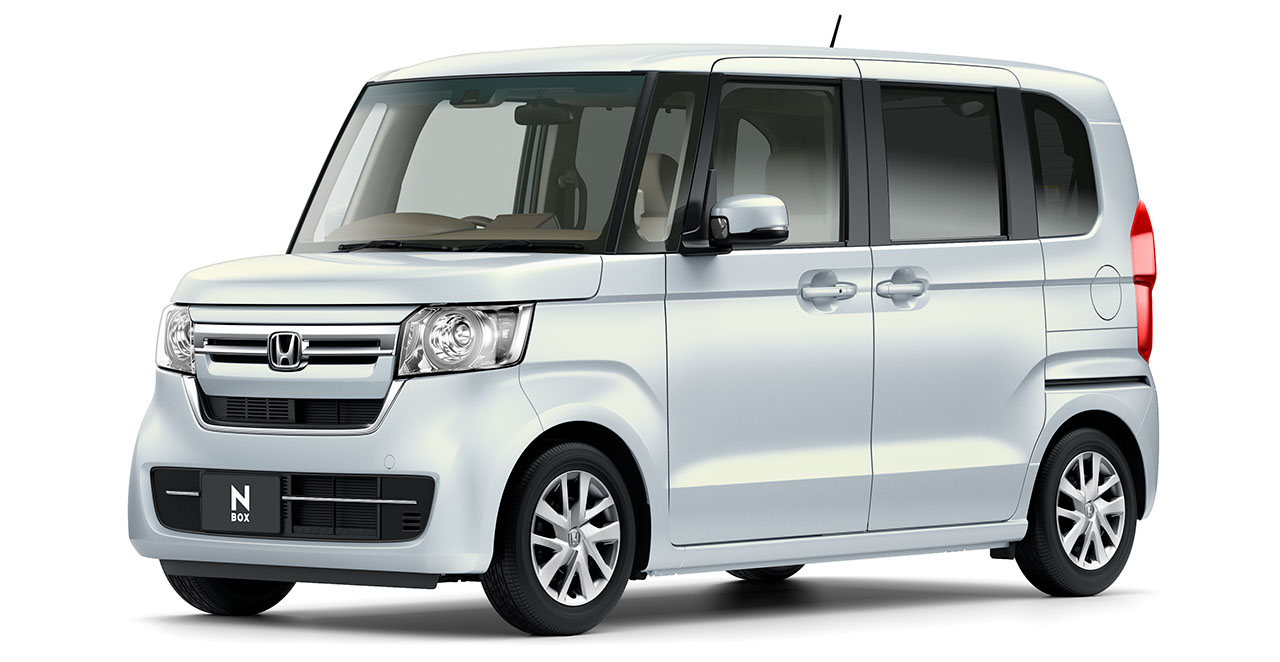 Kei car Honda N-Box cinza visto em 3/4 frontal