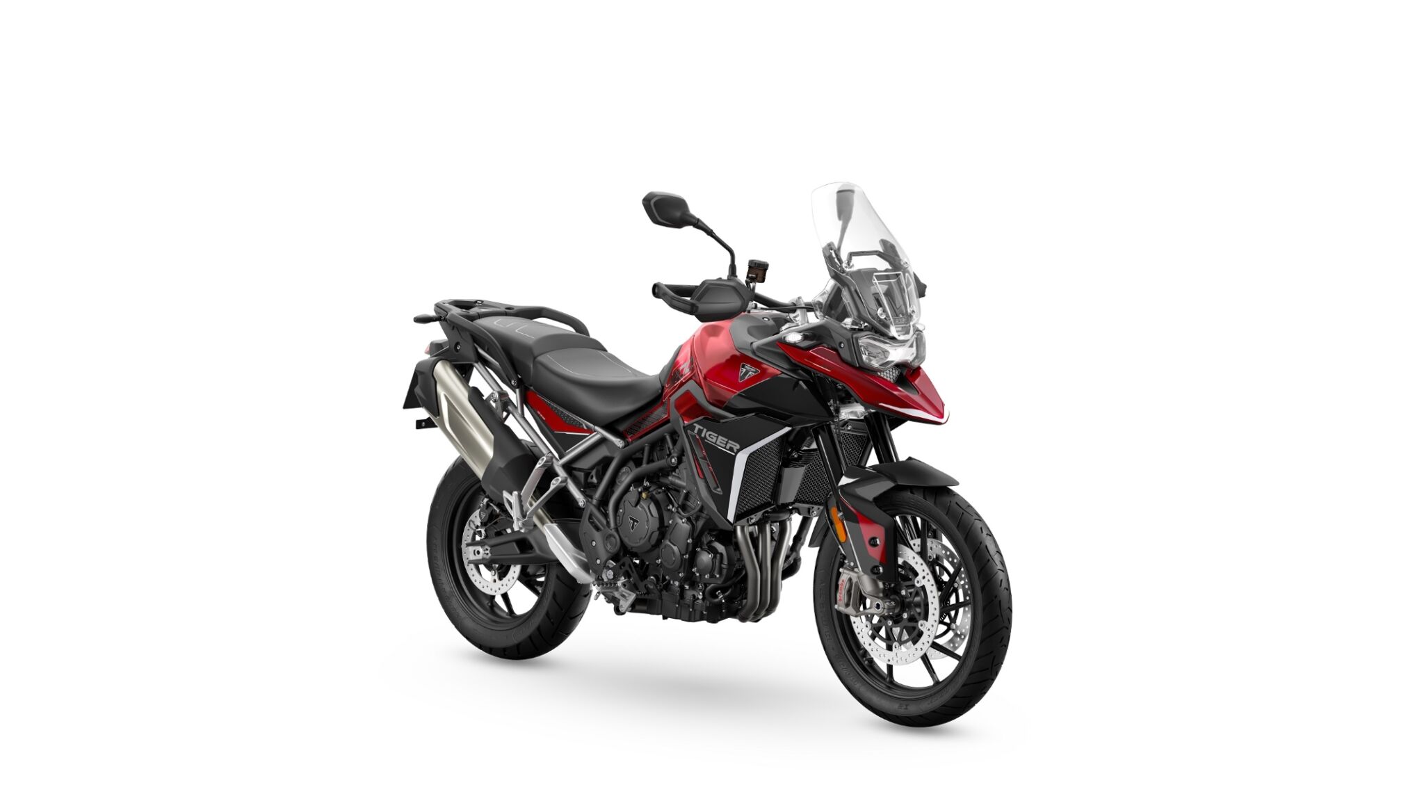 triumph tiger 900 modelo 2024 preto e vermelho de frente estatica no estudio